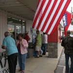 Folks enjoy Petit Jean Hot Dogs and Pepsi