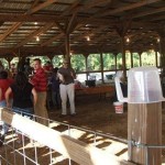 Bob Connell in the white pants is the MC for the Goat Milking Contest