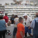 Folks gather around at Mark's Pharmacy