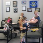 Mom's love the waiting room at the service department