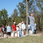 Fishermen line up for the weigh in