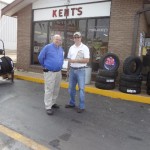 Johnny Kent with Kent's Firestone and Bob Connell with KFFB 106.1 get ready to kick off the parking lot party