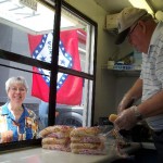 Rich serving up a Petit Jean Hot Dog in a Sunbeam Bun with a Ice Cold Pepsi
