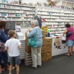 Folks line up to register at Mark's Pharmacy